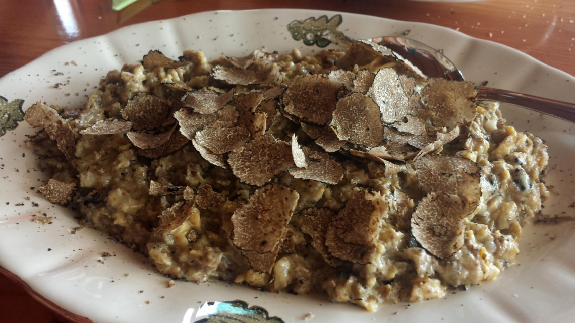 Scrambled eggs heaping with fresh truffle at Karlić Tartufi, a delicious part of truffle hunting Istria.