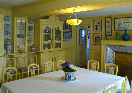 Yellow dining room in Monet's Giverny Home.